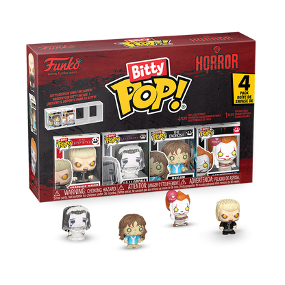 Stock photo of Bitty Pop! Vampire David, Regan, La Llorona, and Pennywise from Warner Bros. Horror Series 1 out of box.