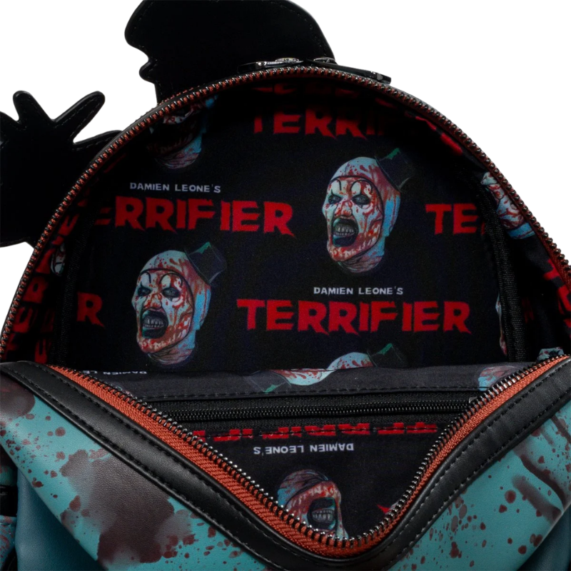 Loungefly Terrifier Art the Clown Blood Splatter Glow-in-the-Dark Mini-Backpack Entertainment Earth Exclusive interior lining with Terrifier print
