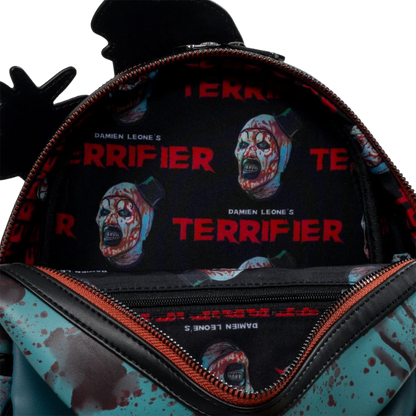 Loungefly Terrifier Art the Clown Blood Splatter Glow-in-the-Dark Mini-Backpack Entertainment Earth Exclusive interior lining with Terrifier print
