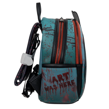 Loungefly Terrifier Art the Clown Blood Splatter Glow-in-the-Dark Mini-Backpack Entertainment Earth Exclusive left side view with ART WAS HERE detail
